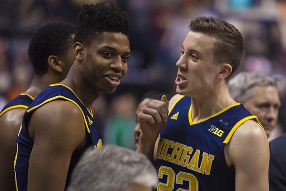 Kameron Chatman (3) and Duncan Robinson (22)
