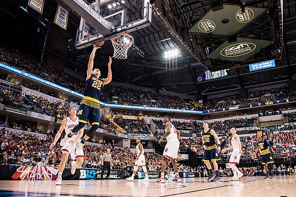 Duncan Robinson (22), Ricky Doyle (32), and Muhammad-Ali Abdur-Rahkman (12)