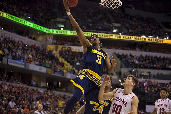 Kameron Chatman (3) and Aubrey Dawkins (24)