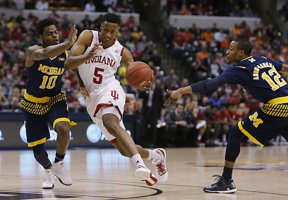 Derrick Walton Jr. (10) and Muhammad-Ali Abdur-Rahkman (12)