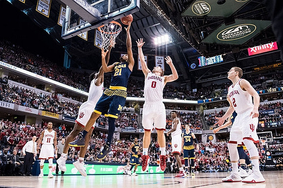 Zak Irvin (21) and Mark Donnal (34)
