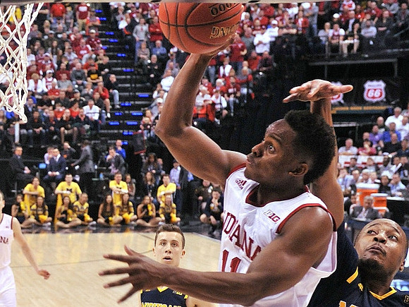 Duncan Robinson (22) and Muhammad-Ali Abdur-Rahkman (12)