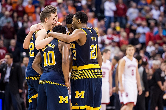 Duncan Robinson (22), Moritz Wagner (13), Derrick Walton Jr. (10), Kameron Chatman (3), and Zak Irvin (21)