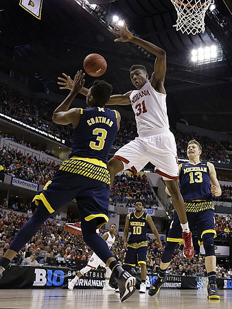 Kameron Chatman (3), Derrick Walton Jr. (10), and Moritz Wagner (13)