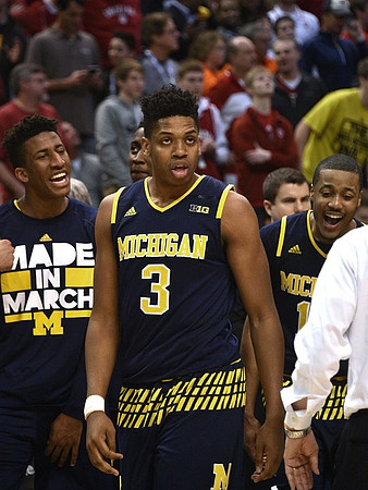 Aubrey Dawkins (24), Kameron Chatman (3), and Muhammad-Ali Abdur-Rahkman (12)