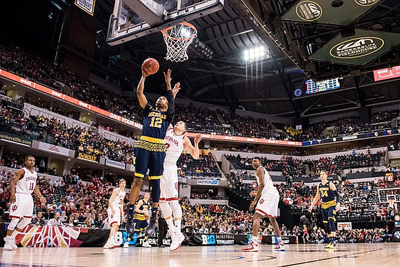 Muhammad-Ali Abdur-Rahkman (12) and Mark Donnal (34)