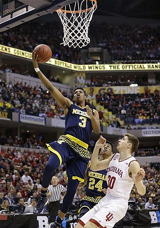Kameron Chatman (3) and Aubrey Dawkins (24)