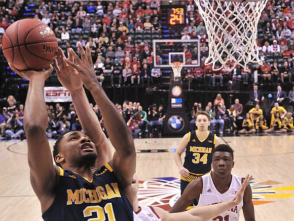 Zak Irvin (21) and Mark Donnal (34)