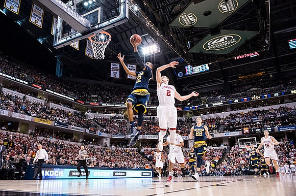 Muhammad-Ali Abdur-Rahkman (12) and Duncan Robinson (22)