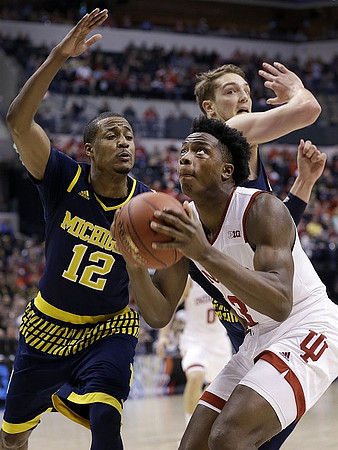 Muhammad-Ali Abdur-Rahkman (12) and Mark Donnal (34)
