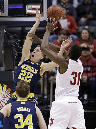 Mark Donnal (34) and Duncan Robinson (22)