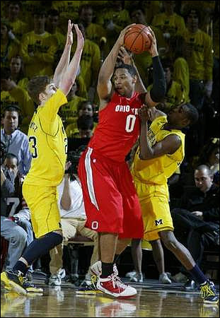 Evan Smotrycz (23) and Tim Hardaway Jr. (10)