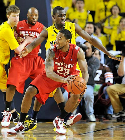 Evan Smotrycz (23) and Tim Hardaway Jr. (10)