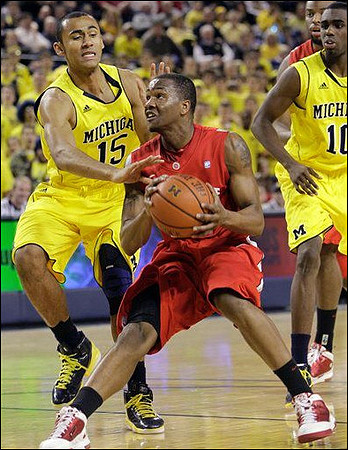 Jon Horford (15) and Tim Hardaway Jr. (10)