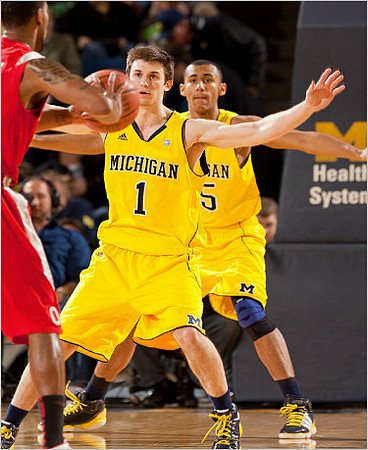 Stu Douglass (1) and Jon Horford (15)