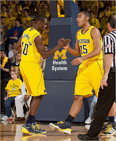 Tim Hardaway Jr. (10) and Jon Horford (15)