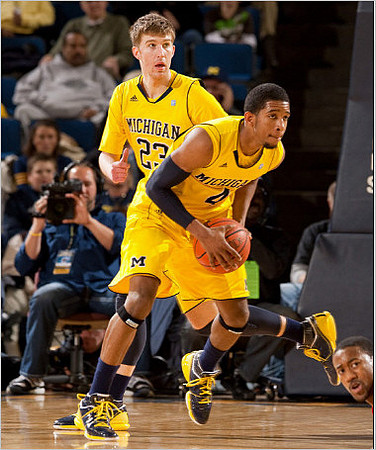 Evan Smotrycz (23) and Darius Morris (4)