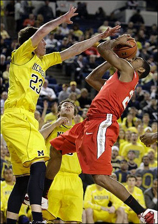 Evan Smotrycz (23) and Zack Novak (0)