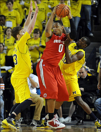 Evan Smotrycz (23) and Tim Hardaway Jr. (10)