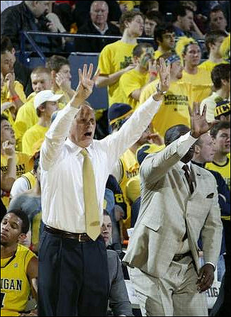 Darius Morris (4), John Beilein, and Bacari Alexander