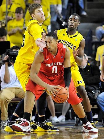 Evan Smotrycz (23) and Tim Hardaway Jr. (10)