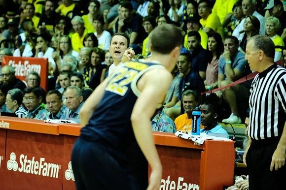 Duncan Robinson (22) and Louisiana State Head Coach Will Wade