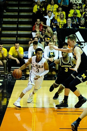 Zavier Simpson (3) and Moritz Wagner (13)