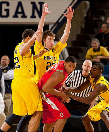 Jordan Morgan (52), Evan Smotrycz (23), and Tim Hardaway Jr. (10)