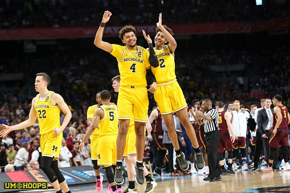 Duncan Robinson (22), Muhammad-Ali Abdur-Rahkman (12), Jaaron Simmons (5), Moritz Wagner (13), Isaiah Livers (4), and Jordan Poole (2)