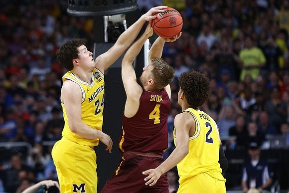 C.J. Baird (24) and Jordan Poole (2)