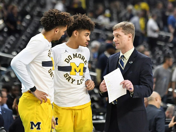 Isaiah Livers (4), Jordan Poole (2), and Luke Yaklich