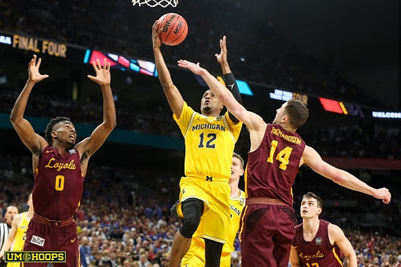 Muhammad-Ali Abdur-Rahkman (12) and Moritz Wagner (13)