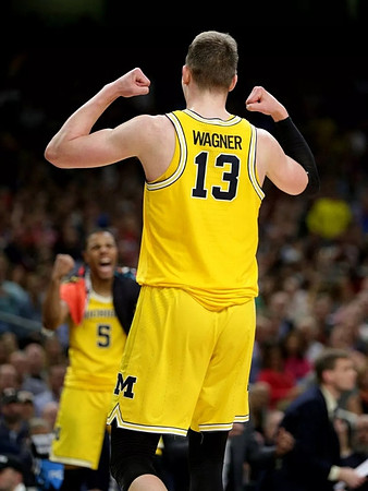 Moritz Wagner (13) and Jaaron Simmons (5)