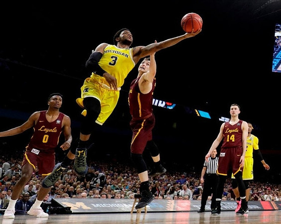 Zavier Simpson (3) and Muhammad-Ali Abdur-Rahkman (12)