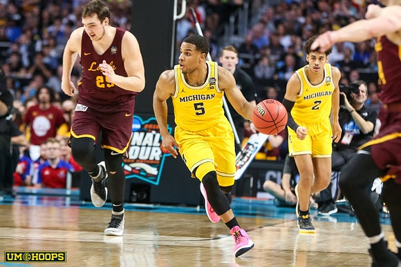 Jaaron Simmons (5) and Jordan Poole (2)