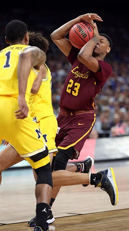 Charles Matthews (1) and Jordan Poole (2)