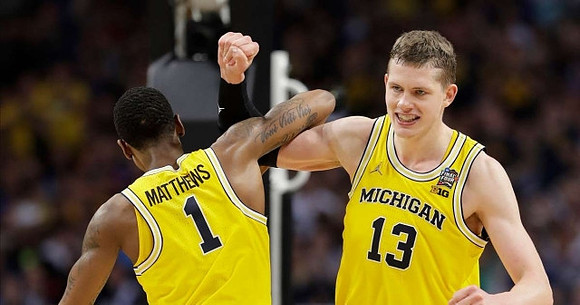 Charles Matthews (1) and Moritz Wagner (13)