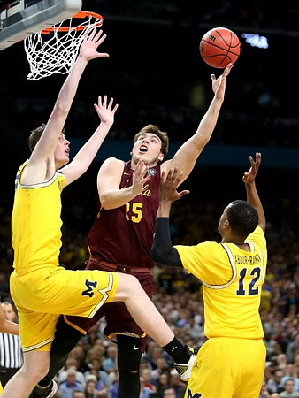 Jon Teske (15) and Muhammad-Ali Abdur-Rahkman (12)