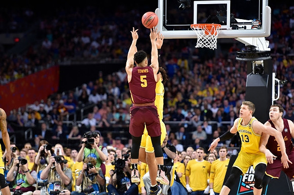 Isaiah Livers (4) and Moritz Wagner (13)