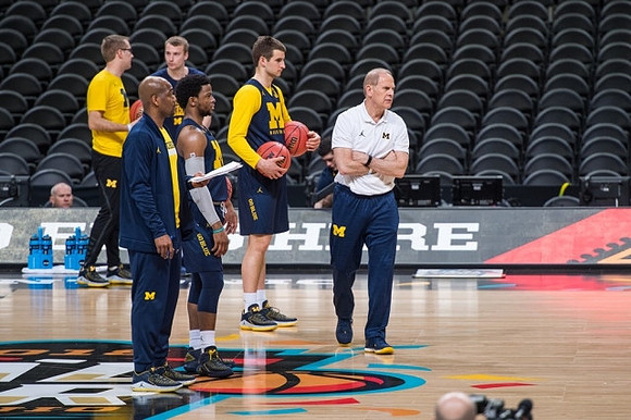Deandre Haynes, Zavier Simpson (3), Austin Hatch (30), and John Beilein