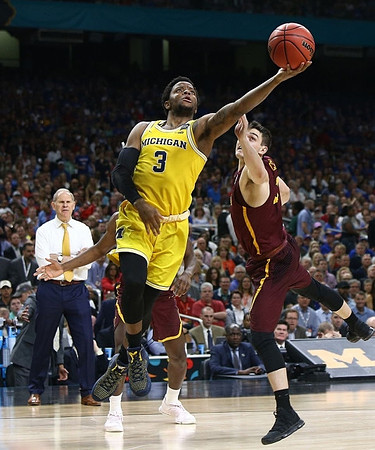 John Beilein and Zavier Simpson (3)