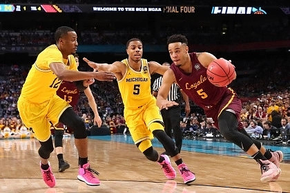 Muhammad-Ali Abdur-Rahkman (12) and Jaaron Simmons (5)