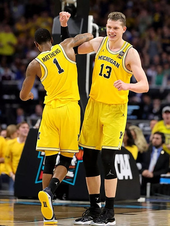 Charles Matthews (1) and Moritz Wagner (13)