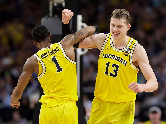 Charles Matthews (1) and Moritz Wagner (13)