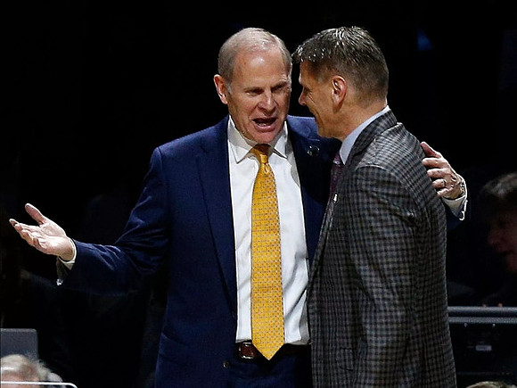 John Beilein and Loyola Chicago Head Coach Porter Moser