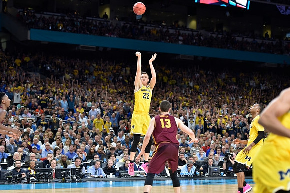 Duncan Robinson (22) and Muhammad-Ali Abdur-Rahkman (12)