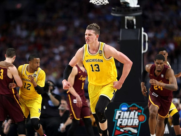 Muhammad-Ali Abdur-Rahkman (12), Moritz Wagner (13), and Charles Matthews (1)