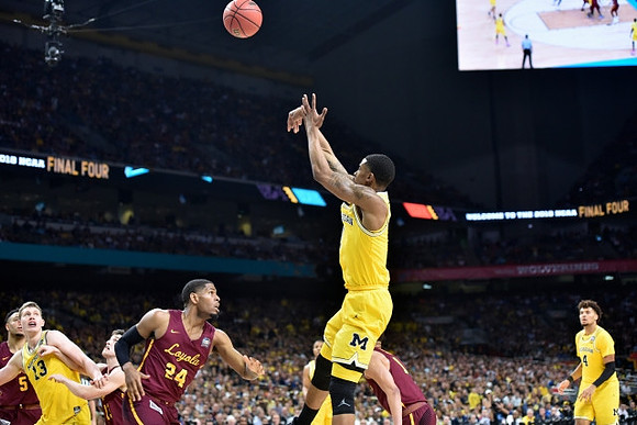 Moritz Wagner (13), Charles Matthews (1), and Isaiah Livers (4)