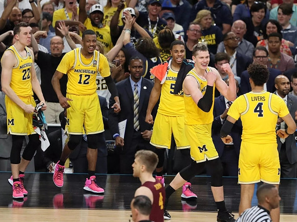 Duncan Robinson (22), Muhammad-Ali Abdur-Rahkman (12), Jaaron Simmons (5), Moritz Wagner (13), and Isaiah Livers (4)