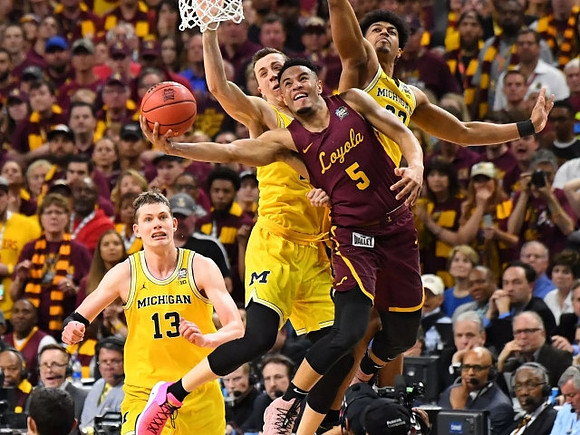 Moritz Wagner (13), Duncan Robinson (22), and Ibi Watson (23)